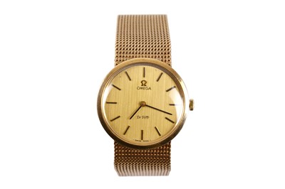 Lot 90 - OMEGA. A 9K GOLD MANUAL WIND BRACELET WATCH....