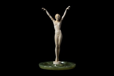 Lot 17 - A FRENCH ART DECO PERIOD CARVED IVORY FIGURE...
