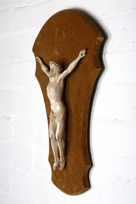 Lot 34 - A 19TH CENTURY CARVED IVORY CORPUS CHRISTI the...