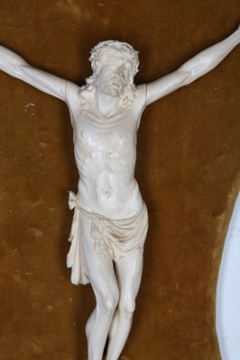 Lot 34 - A 19TH CENTURY CARVED IVORY CORPUS CHRISTI the...