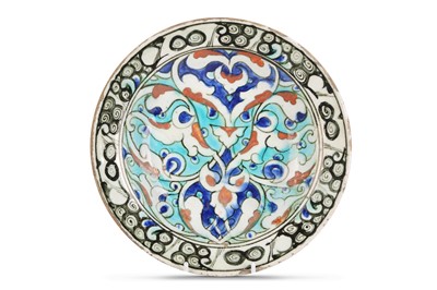 Lot 81 - AN IZNIK POTTERY DISH Ottoman Turkey, 17th...