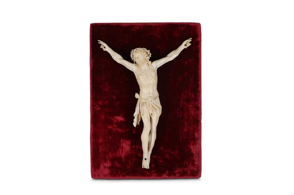 Lot 32 - A 19TH CENTURY CARVED IVORY CORPUS CHRISTI the...