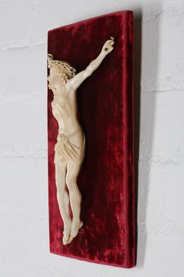 Lot 32 - A 19TH CENTURY CARVED IVORY CORPUS CHRISTI the...