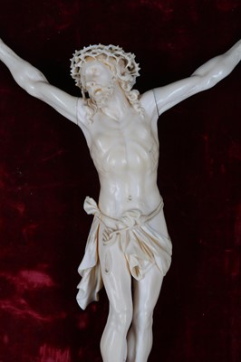 Lot 32 - A 19TH CENTURY CARVED IVORY CORPUS CHRISTI the...