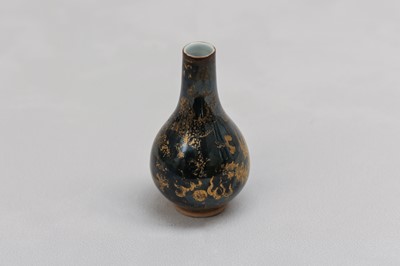 Lot 79 - A CHINESE GILT-DECORATED BLACK-GLAZED 'DRAGON' VASE.