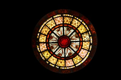 Lot 121 - A 19TH CENTURY STAINED AND LEADED GLASS...