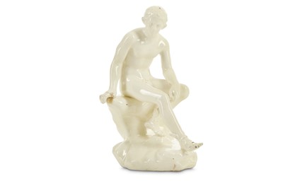 Lot 114 - A WHITE GLAZED EARTHENWARE FIGURE OF THE...