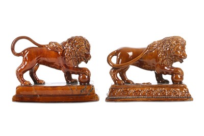 Lot 115 - TWO STAFFORDSHIRE POTTERY TREACLE-GLAZED...