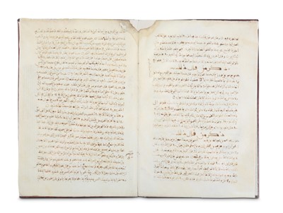 Lot 23 - A SECTION FROM AN ANDALUSIAN MANUSCRIPT ...