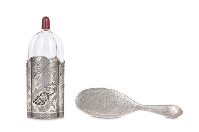 Lot 180 - A LATE QAJAR SILVER BRUSH AND GLASS BOTTLE ...
