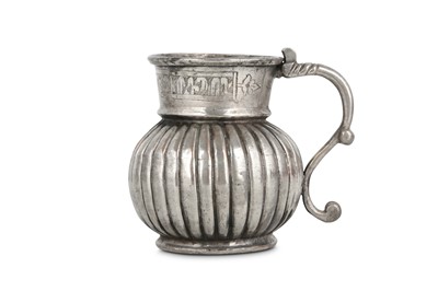 Lot 72 - A TINNED COPPER JUG Ottoman Provinces, 18th -...