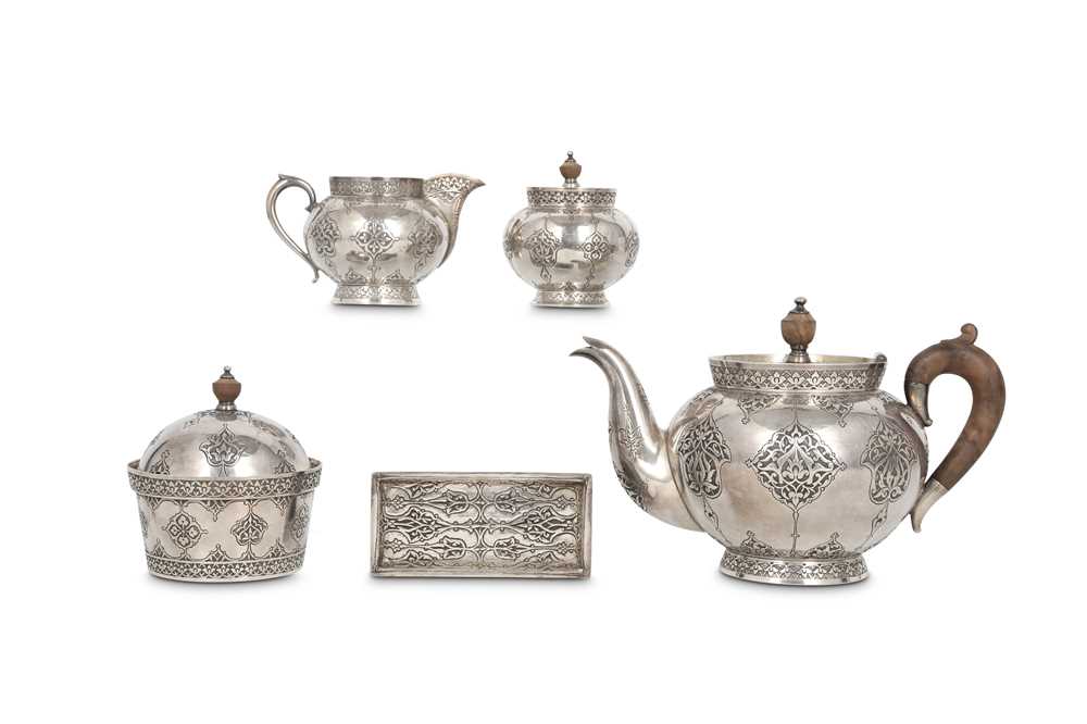 Lot 259 - A SAFAVID-STYLE INCISED KASHMIRI SILVER TEA...