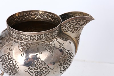 Lot 259 - A SAFAVID-STYLE INCISED KASHMIRI SILVER TEA...