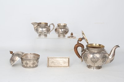 Lot 259 - A SAFAVID-STYLE INCISED KASHMIRI SILVER TEA...