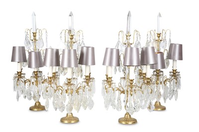 Lot 15 - A SET OF FOUR LOUIS XVI STYLE BRONZE AND CUT...