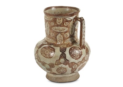 Lot 11 - A COPPER-LUSTRE POTTERY JUG  Kashan, Iran,...