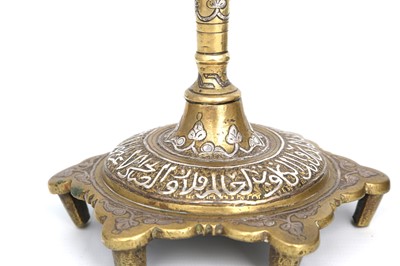 Lot 113 - A MAMLUK-REVIVAL BRASS BOWL AND CANDLESTICK...