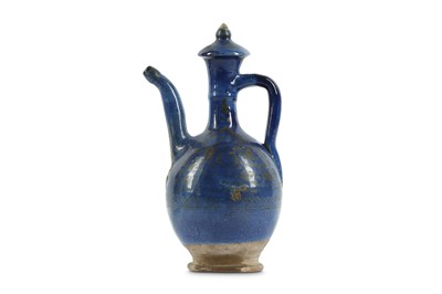 Lot 157 - A BLUE-GLAZED LUSTRE POTTERY WATER JUG Iran,...