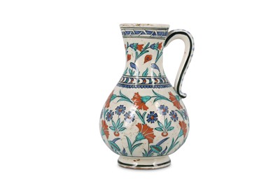 Lot 119 - AN IZNIK-STYLE POTTERY JUG Possibly France,...