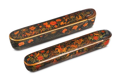 Lot 188 - TWO QAJAR LACQUERED PAPIER-MÂCHÉ PEN CASES...