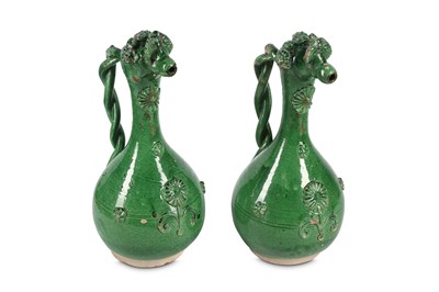 Lot 107 - TWO LIGHT GREEN-GLAZED CANAKKALE POTTERY EWERS...