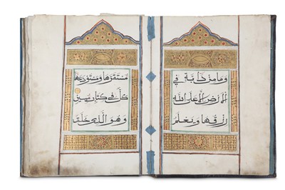 Lot 59 - * AN ILLUMINATED QUR'ANIC SECTION, JUZ' 12...