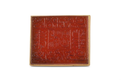Lot 171 - * A FINE QAJAR ENAMELLED CARNELIAN-SET GOLD...