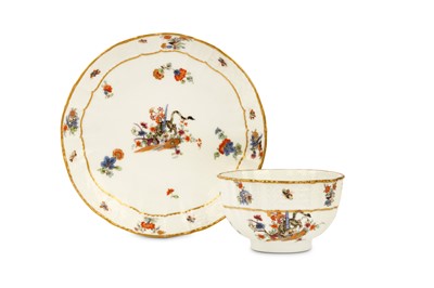 Lot 69 - A MEISSEN TEACUP AND SAUCER, circa 1745, with...