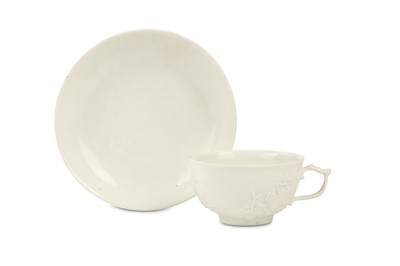 Lot 49 - A MEISSEN WHITE TEACUP AND SAUCER, circa 1745,...