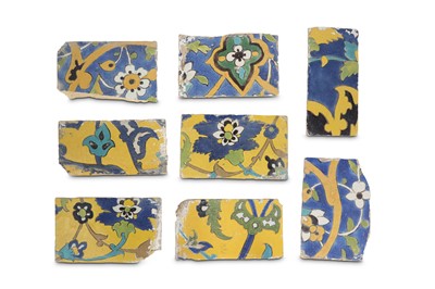 Lot 143 - EIGHT FRAGMENTS OF SAFAVID CUERDA SECA POTTERY...