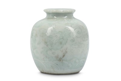 Lot 156 - A CHINESE WHITE-GLAZED ‘DRAGON’ JAR. Qing...