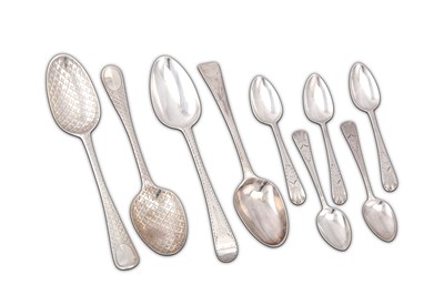 Lot 801 - A mixed group of flatware including a George...