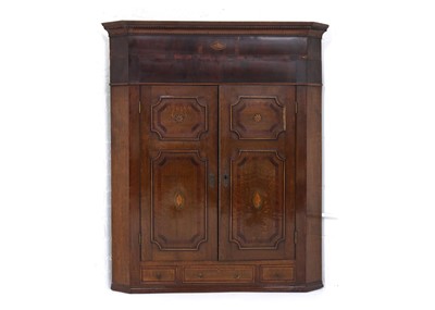 Lot 725 - A George IV oak and mahogany hanging corner...