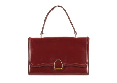 Lot 377 - Hermes Vintage Burgundy Stirrup Handbag, 1950s,...