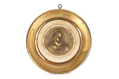 Lot 604 - A mid 18th century gilt bronze relief...