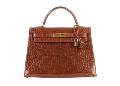 Lot 376 - Hermes Miel Porosus Crocodile Kelly 32, c....