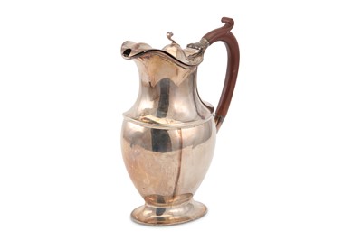 Lot 326 - A George V sterling silver hot water pot,...
