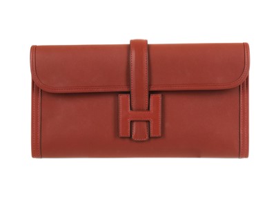 Lot 378 - Hermes Rouge H Swift Elan Jige Clutch, c. 2016,...