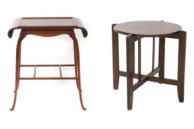Lot 663 - A 20th Century hardwood circular topped...
