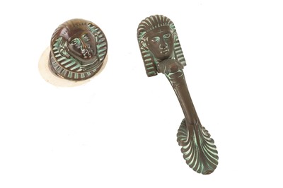 Lot 629 - An Egyptian revival verdigris bronze door...