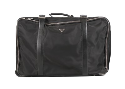 Lot 122 - Prada Black Nylon and Leather Wheeled Suitcase,...