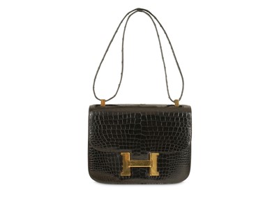 Lot 222 - Hermes Black Crocodile Constance, c. 1972,...