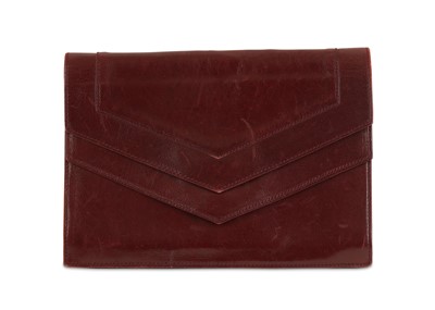 Lot 433 - Yves Saint Laurent Burgundy Leather Clutch,...