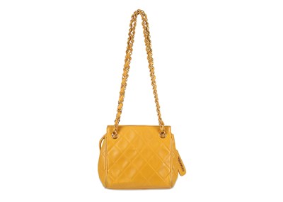 Lot 345 - Chanel Yellow Micro Shoulder Bag, c. 1994-96,...