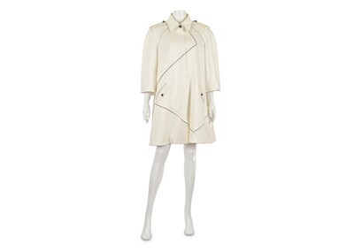 Lot 311 - Chanel Cream Trench Coat, 2010s, bracelet...