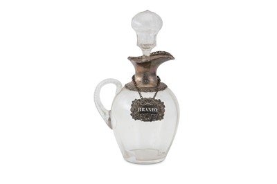 Lot 385 - An Edwardian sterling silver mounted claret...