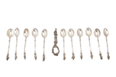 Lot 386 - A set of twelve German 930 standard silver...