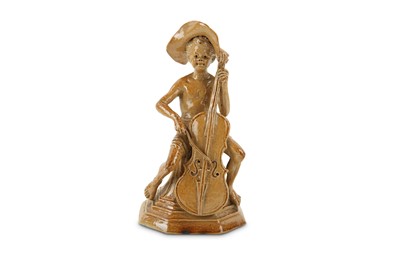 Lot 528 - A Royal Doulton stoneware Merry Musician...