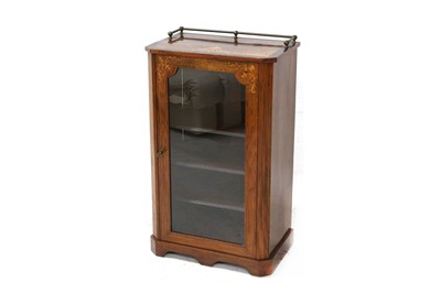 Lot 714 - A late 19th Century inlaid walnut pier cabinet...