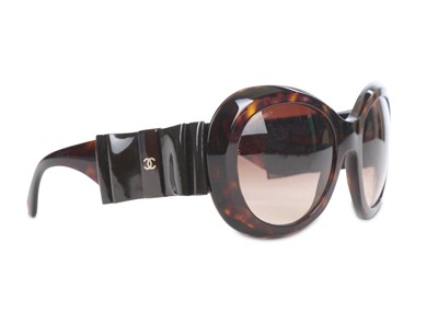 Lot 193 - Chanel Bow Style Sunglasses, faux tortoise...